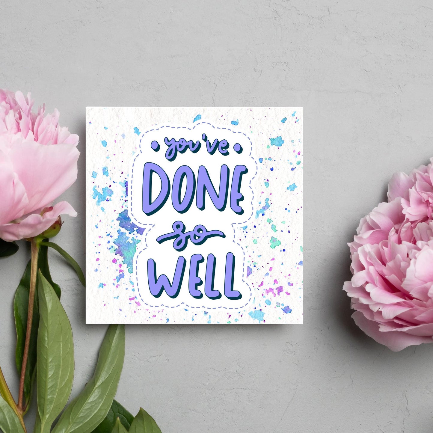 Square card with pastel colour paint splatter and white background. in the centre of the card is a sticker style image with you've done so well in a lilac cursive font