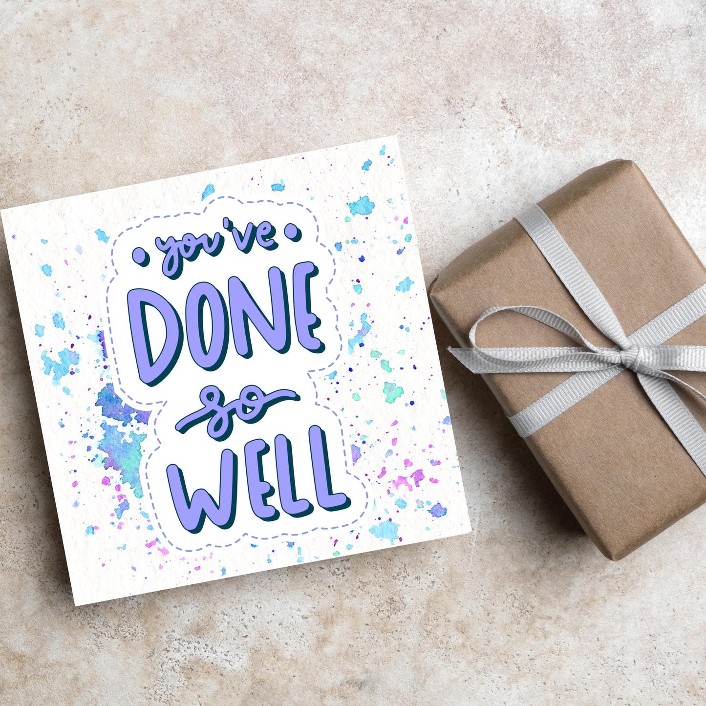 Square card with pastel colour paint splatter and white background. in the centre of the card is a sticker style image with you've done so well in a lilac cursive font