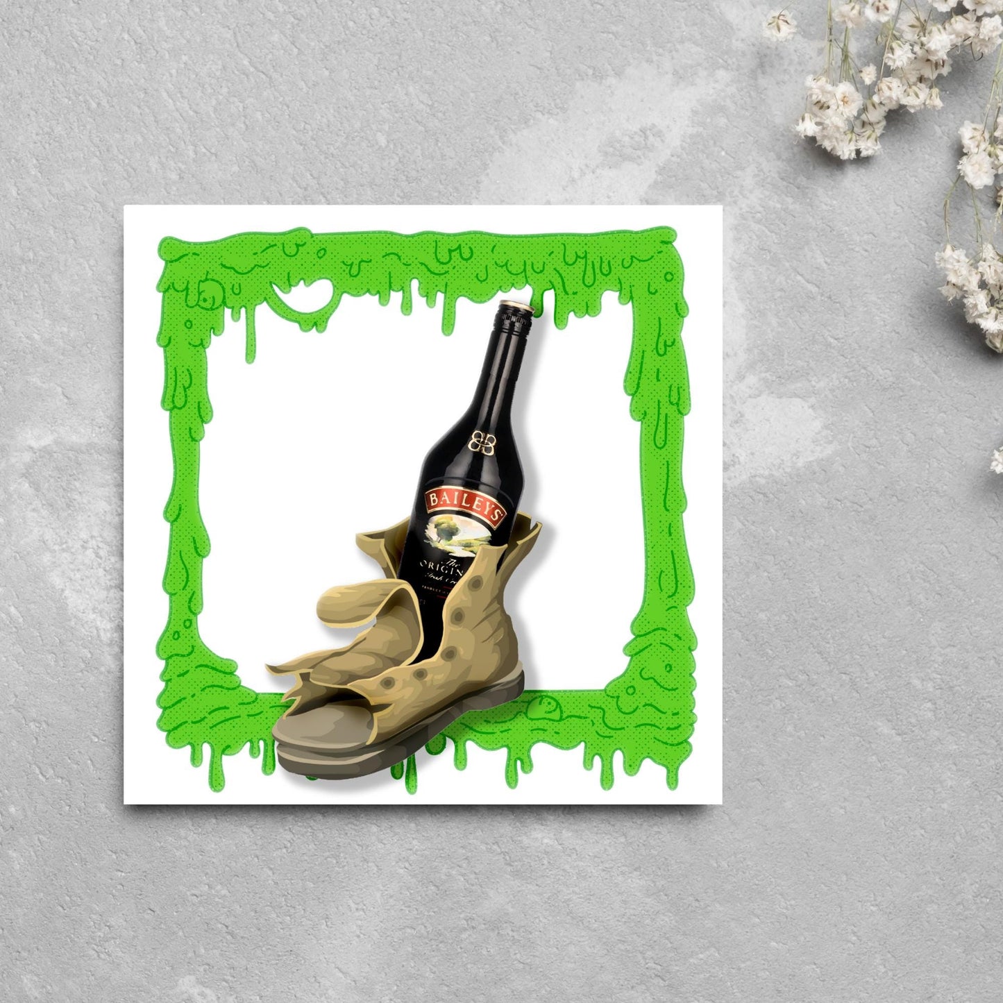 image of a square greetings card with a green slime frame with an image of an old boot with a bottle of baileys inside it