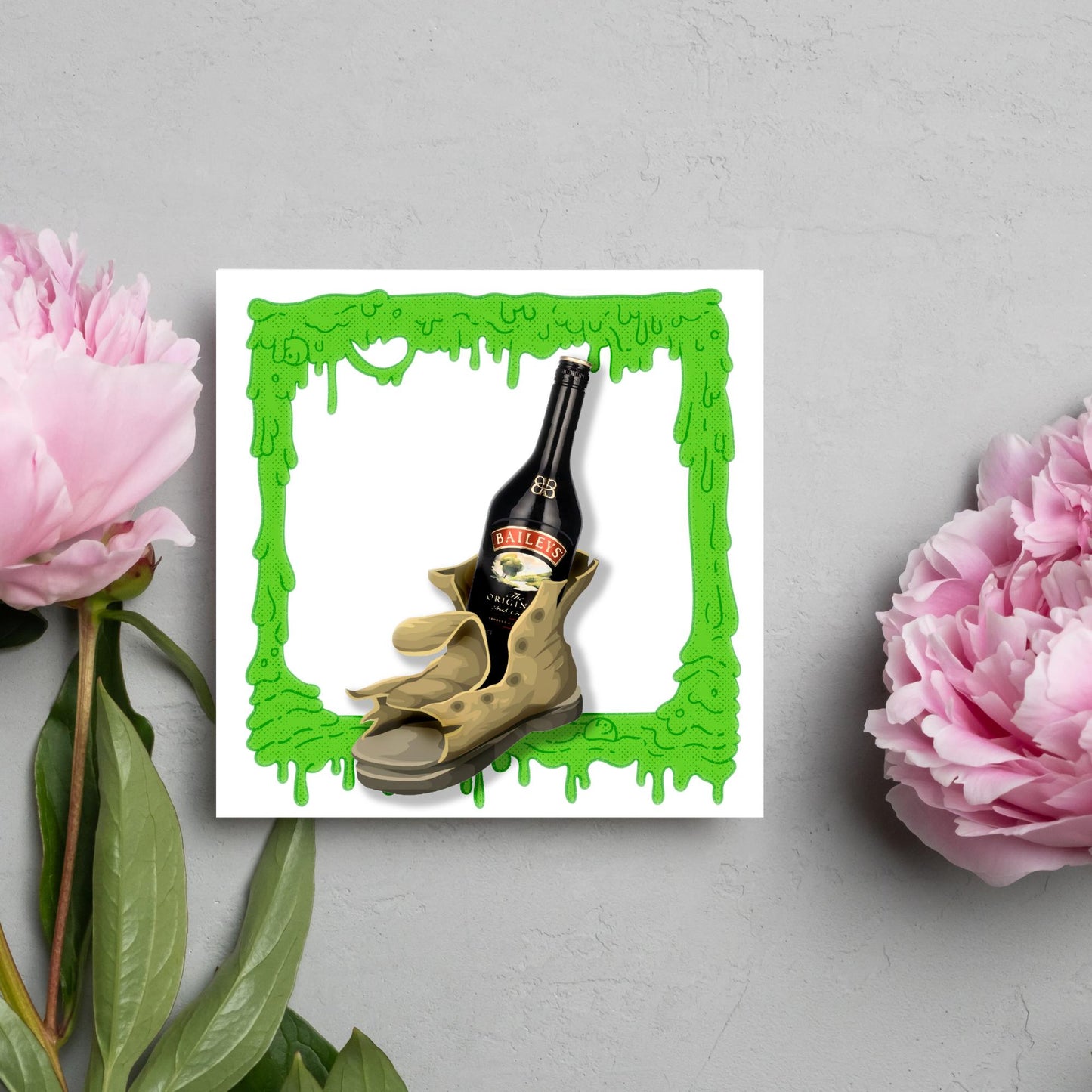 image of a square greetings card with a green slime frame with an image of an old boot with a bottle of baileys inside it