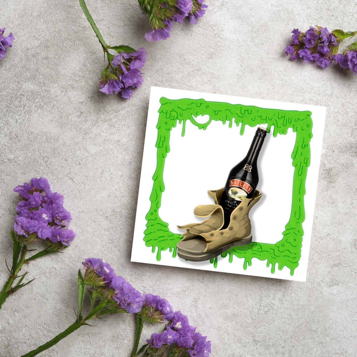 image of a square greetings card with a green slime frame with an image of an old boot with a bottle of baileys inside it
