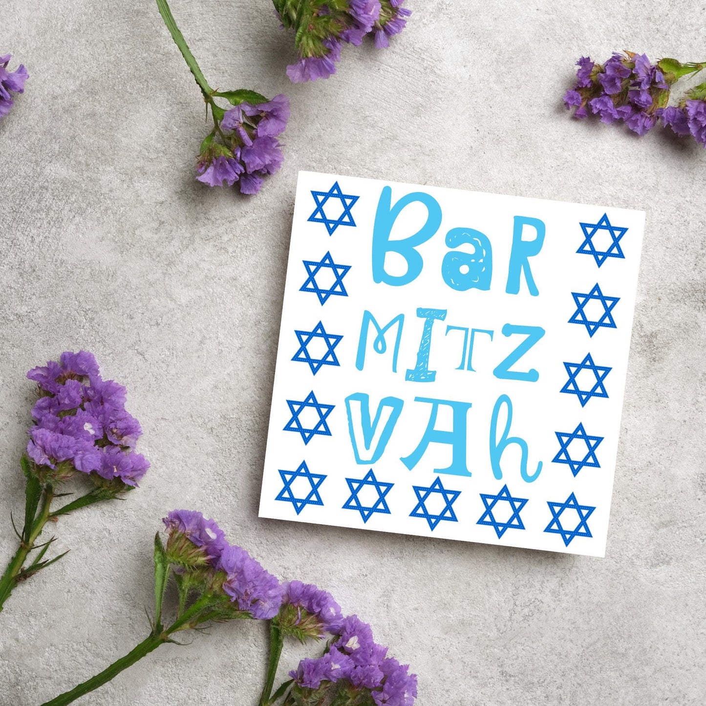 square greeting card for bar mitzvah with blue text bar mitzvah in a hand drawn style made of different fonts surrounded by 13 stars of David in navy blue