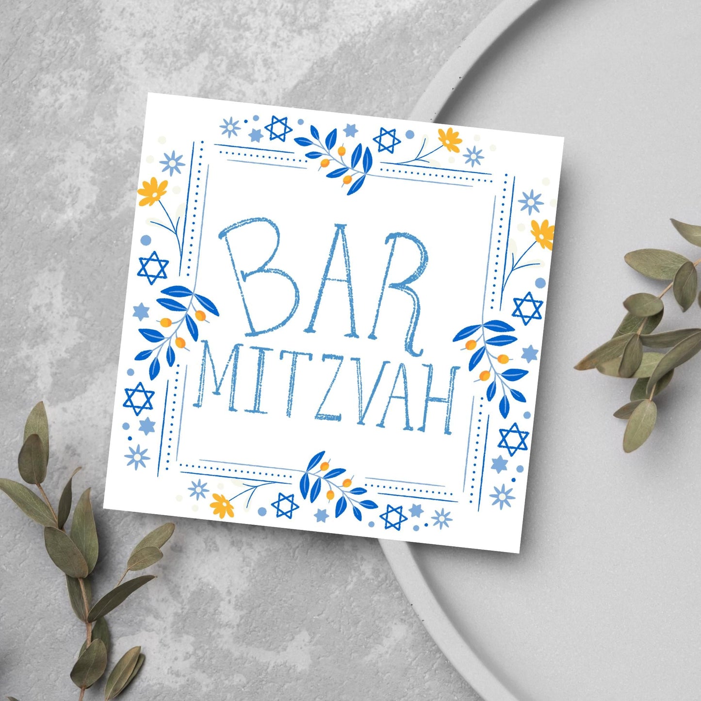 square bar mitzvah card with a sketchy drawn bar mitzvah in the centre in a soft blue, with a decorative frame featuring flowers and stars of david in blues and yellows