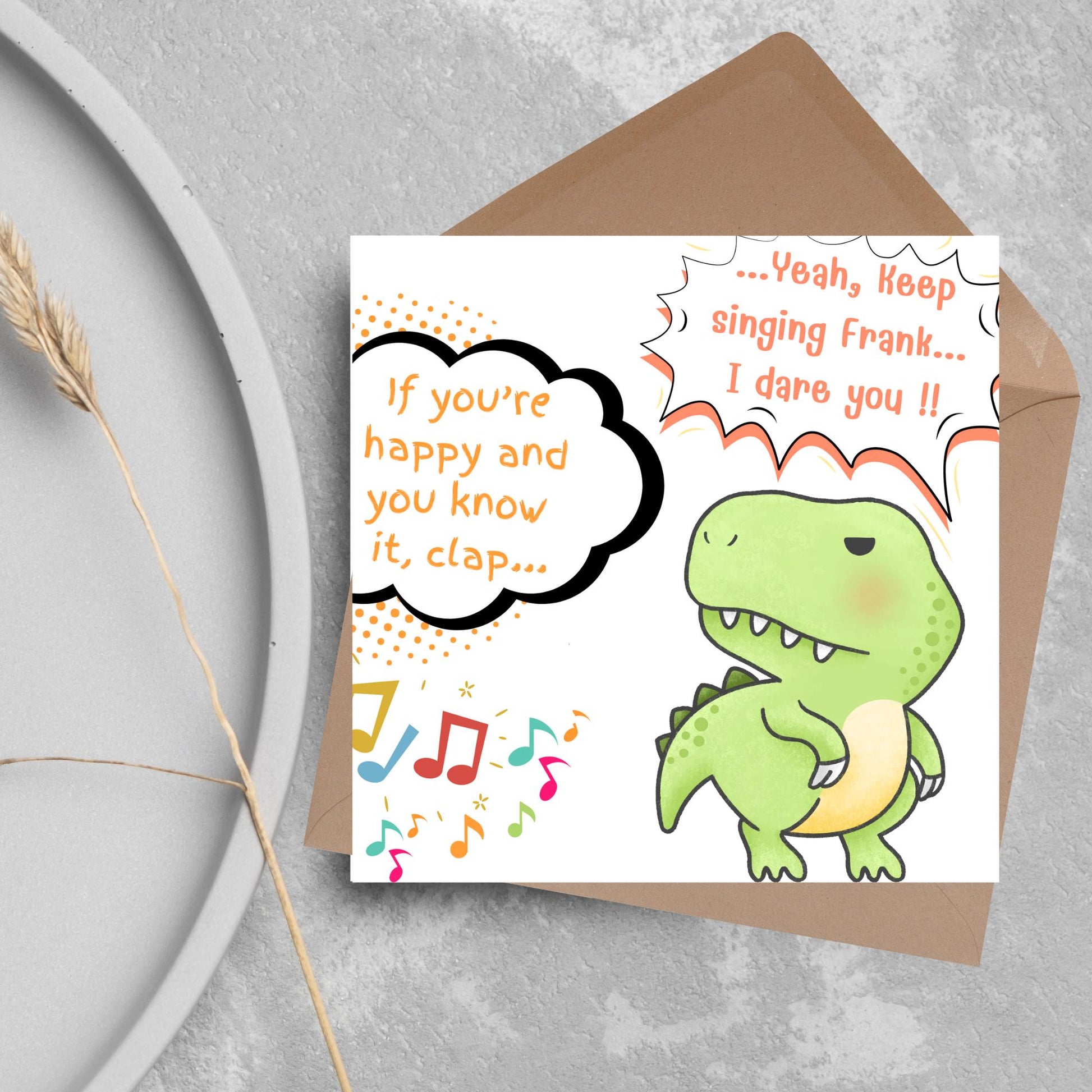 A cute, grumpy green T-Rex with tiny arms is featured. Text reads, "If you're happy and you know it, clap..." The T-Rex responds, "...Yeah, keep singing Frank... I dare you!!" Musical notes add a playful touch.
