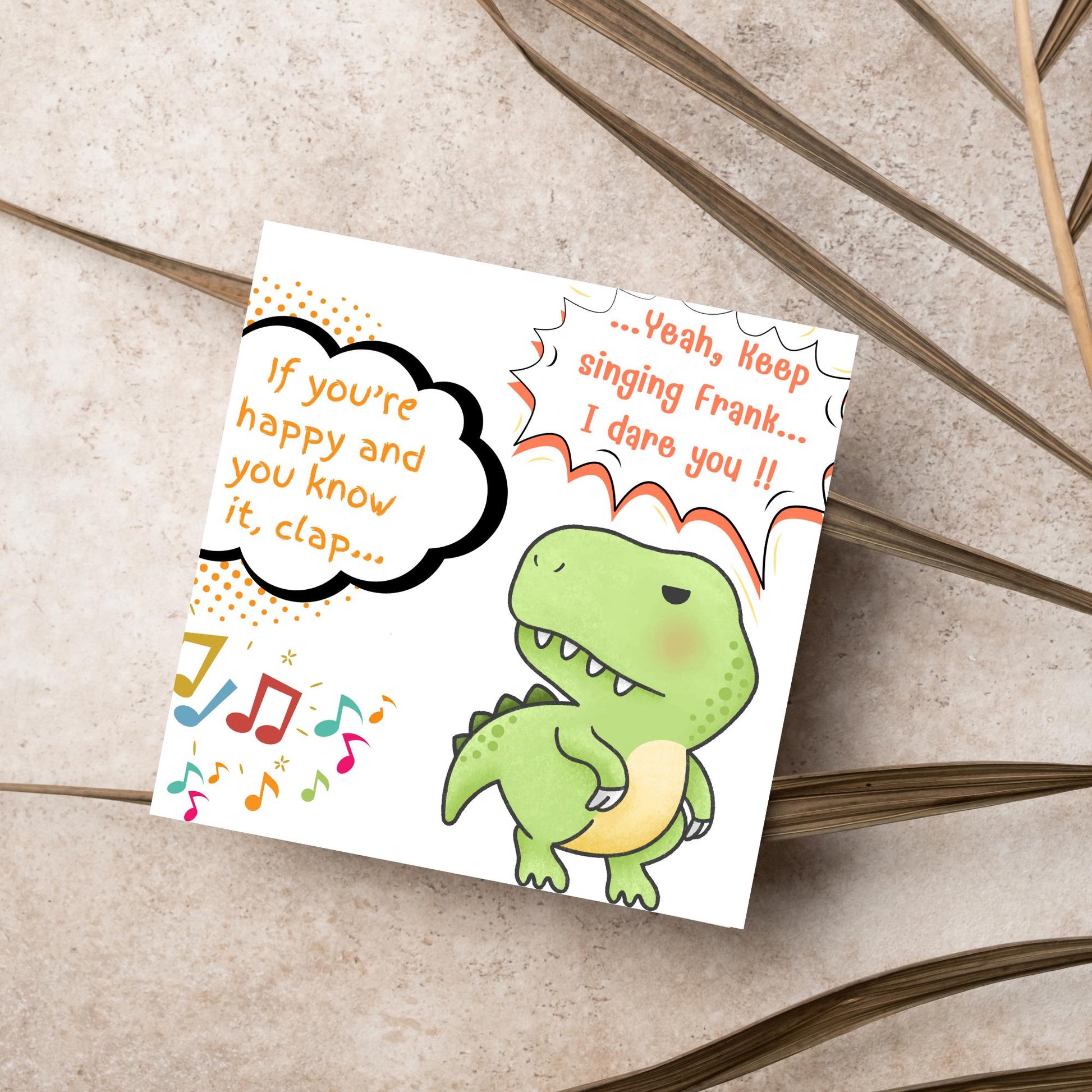 A cute, grumpy green T-Rex with tiny arms is featured. Text reads, "If you're happy and you know it, clap..." The T-Rex responds, "...Yeah, keep singing Frank... I dare you!!" Musical notes add a playful touch.