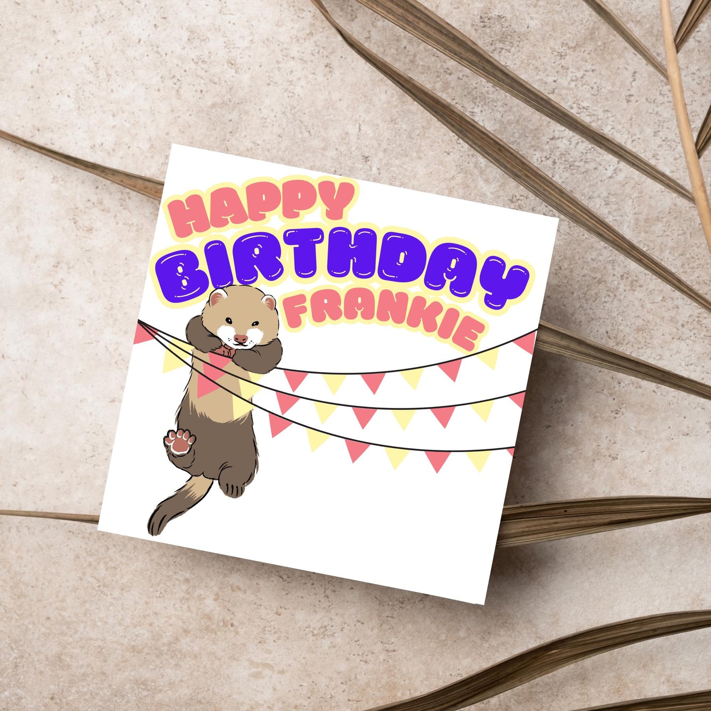 square card with an image of a ferret hanging off pink and yellow bunting with bold pink and purple text above that reads happy birthday frankie in a bubble font