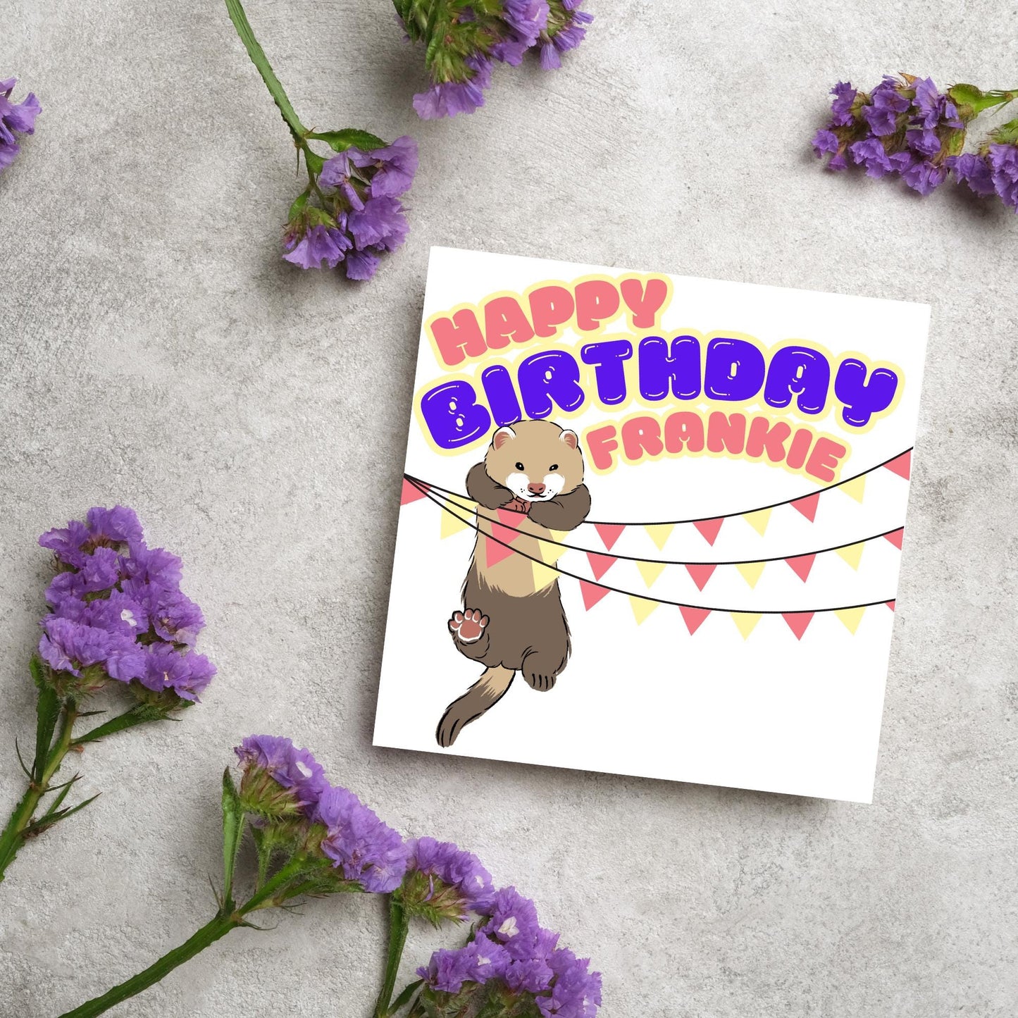 square card with an image of a ferret hanging off pink and yellow bunting with bold pink and purple text above that reads happy birthday frankie in a bubble font
