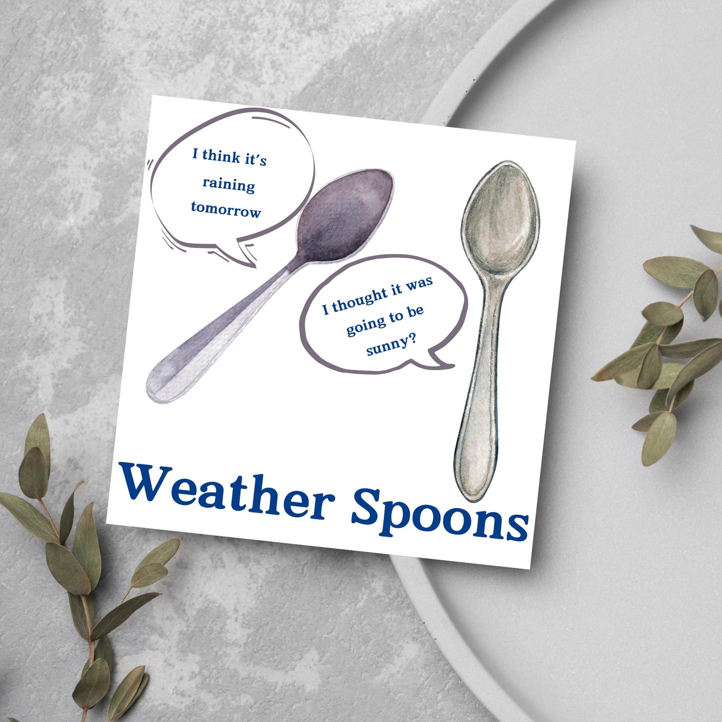 Image of a square greeting card. The card has a white backdrop with an illustration of two spoons with speech bubbles. One says I think it's raining tomorrow. The other says I thought it was going to be sunny? Underneath the illustration in a blue font is the text Weather Spoons