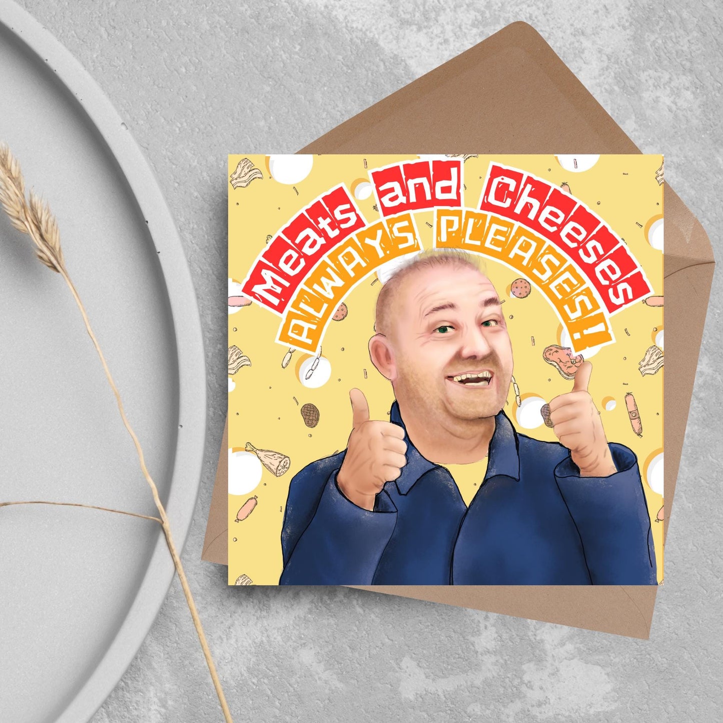 Square greeting card with a hand drawn image of Bob MOrtimer with 2 thumbs up against a backdrop of swiss cheese and various illustrations of different types of meat, with arched text that reads 'meats and cheeses always pleases'