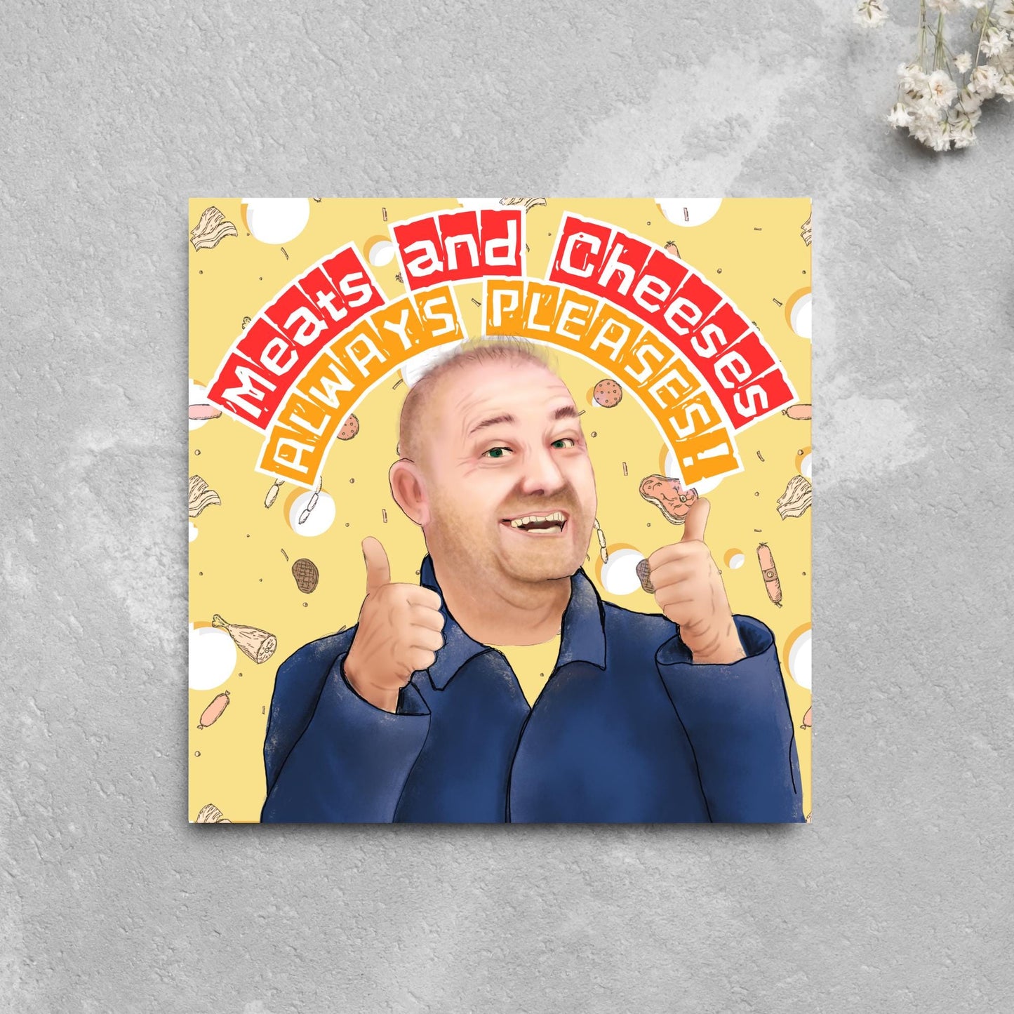 Square greeting card with a hand drawn image of Bob MOrtimer with 2 thumbs up against a backdrop of swiss cheese and various illustrations of different types of meat, with arched text that reads 'meats and cheeses always pleases'