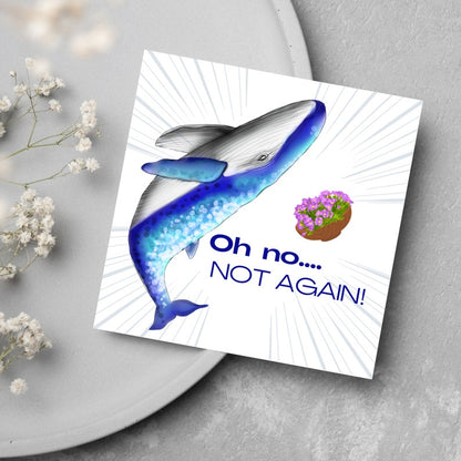Image of a square greetings card against a grey background. The design is A Hitchhikers Guide to the Galaxy Whale