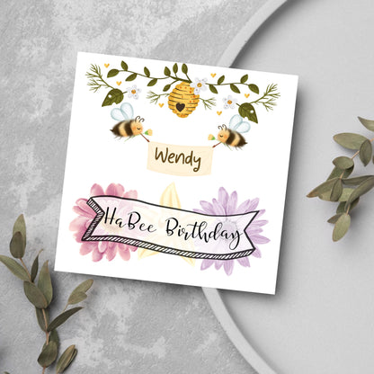 watercolour birthday card with bees and flowers and name banner