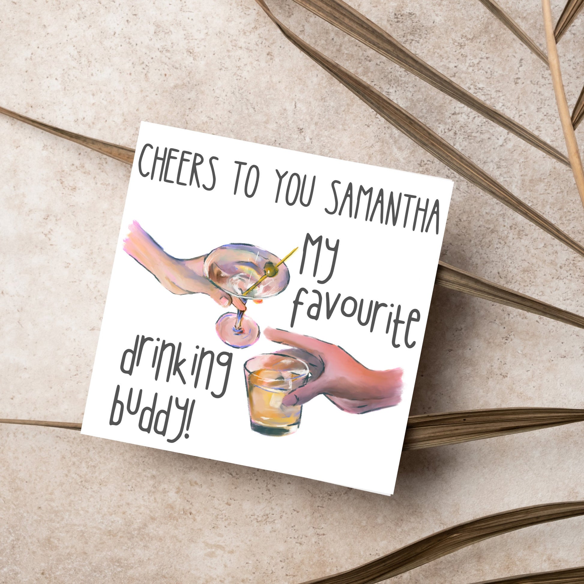 Square card with watercolour design of 2 hands holding drinks glasses against a white background, with grey text that reads &quot;cheers to you Samantha, my favourite drinking buddy&quot;