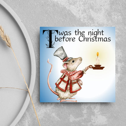 Square Christmas card with a Dickensian Mouse holding a candle in the dark. The mouse is dressed in Victorian clothes and the text &#39;twas the night before christmas&#39; is written across the top of the card