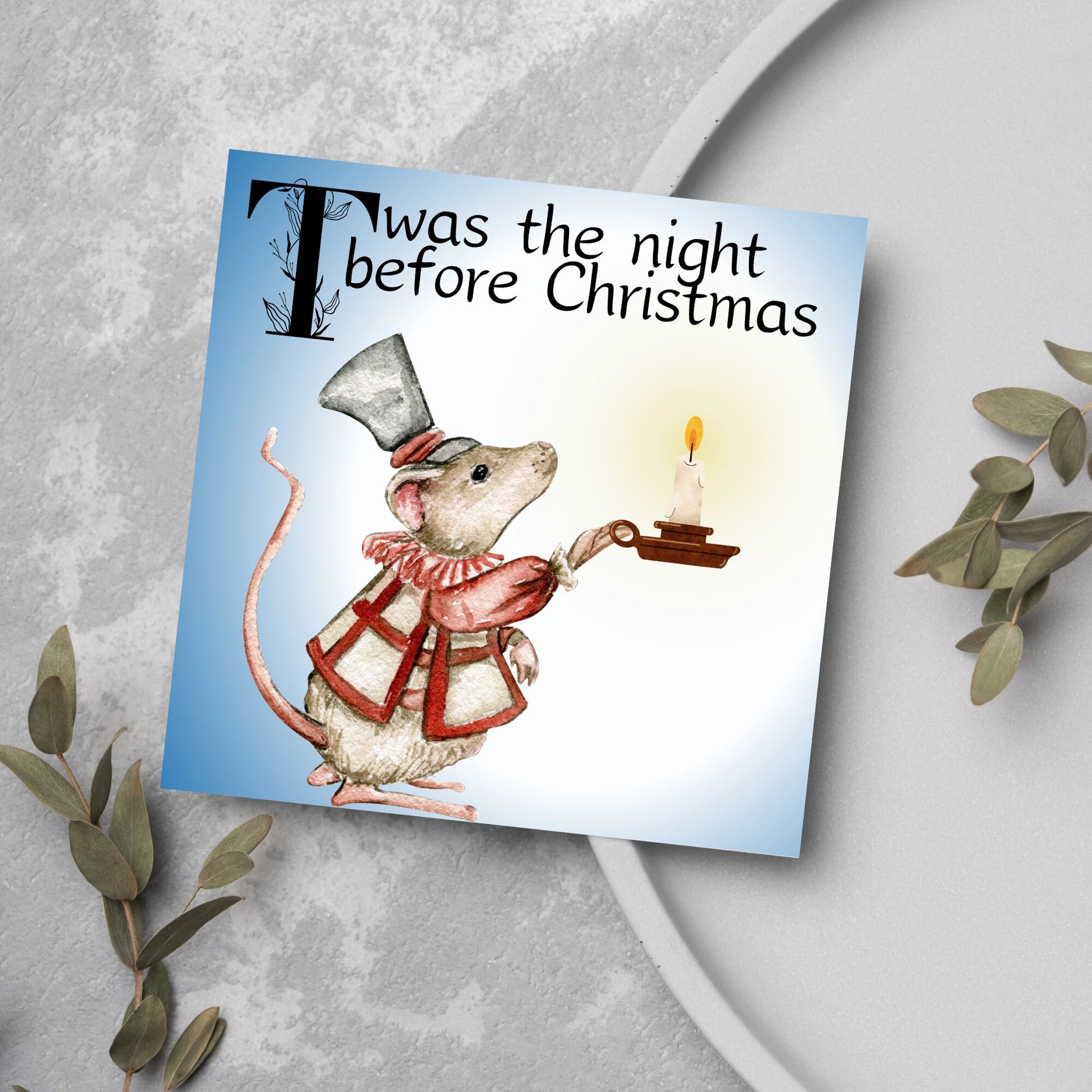 Square Christmas card with a Dickensian Mouse holding a candle in the dark. The mouse is dressed in Victorian clothes and the text &#39;twas the night before christmas&#39; is written across the top of the card