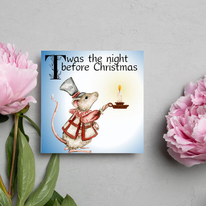 Square Christmas card with a Dickensian Mouse holding a candle in the dark. The mouse is dressed in Victorian clothes and the text &#39;twas the night before christmas&#39; is written across the top of the card