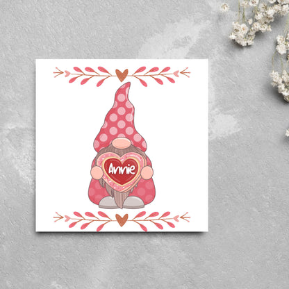 The Square Card has a cute gonk holding a love heart with a perssonalised name, the card has a cute heart header and footer, The Card is a cute representation of love, The Card is perfect for your valentines