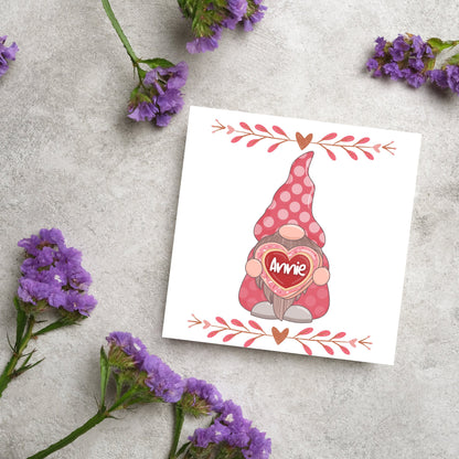 The Square Card has a cute gonk holding a love heart with a perssonalised name, the card has a cute heart header and footer, The Card is a cute representation of love, The Card is perfect for your valentines