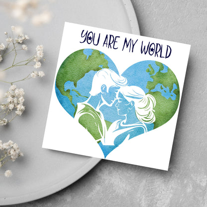 The Square Card has the year in a traditional heart love shape, with a couple embracing eachother. The caption reads &quot;You are my World&quot; This valentines day card is perfect for loved ones, for boyfriend, for girlfriend, for wife, for husband