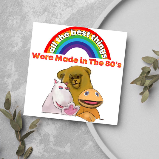 square card featuring an illustration of the characters from the tv show rainbow with a rainbow and red text that reads  &#39;all the best things were&#39; made in the 80&#39;s&#39; in the font from the shows title
