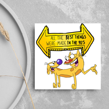 square card featuring an illustration of catdog with a yellow and black sign above them with the text that reads  &#39;all the best things were&#39; made in the 90&#39;s&#39; in the font from the shows title