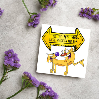 square card featuring an illustration of catdog with a yellow and black sign above them with the text that reads  &#39;all the best things were&#39; made in the 90&#39;s&#39; in the font from the shows title