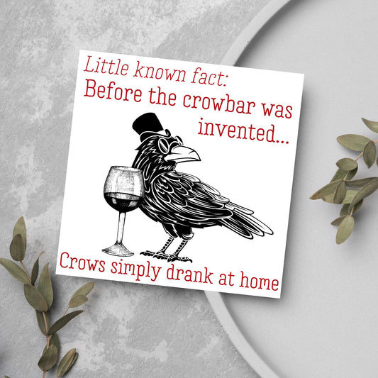 image of a square greetings card with a black and white drawing of a crow wearing a top hat and spectacles, standing next to a half empty glass of wine and the text - little known fact: before the crowbar was invented...crows simply drank at home