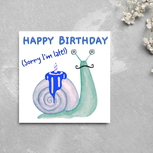 cartoon snail with melted candle on shell, sorry I'm late card 