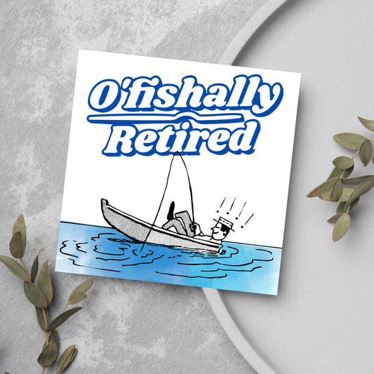 square card with a cartoon of a man in a boat looking happy and relaxed with a fishing rod. big blue and white text reads - ofishally retired&#39;