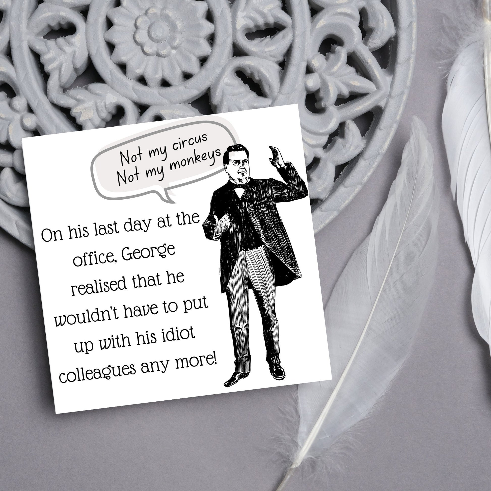 square card with a drawing of an edwardian gentleman with a speech bubble that says Not my Circus, Not my Monkeys and text, on his last day at the office, george realised that he wouldn&#39;t have to put up with his idiot colleagues any more