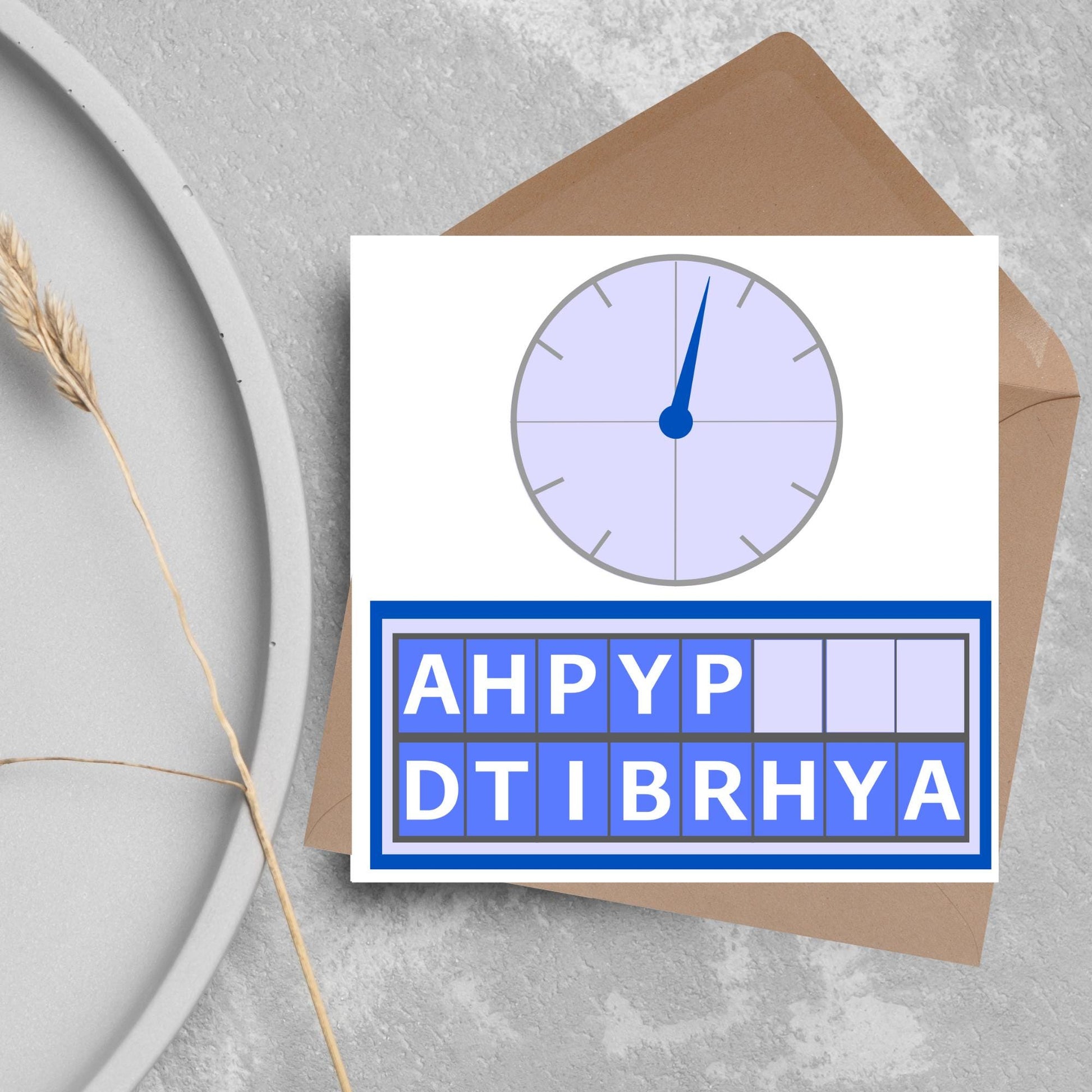 Square birthday card with a countdown theme with the clock and jumbled up letters that spell happy birthday