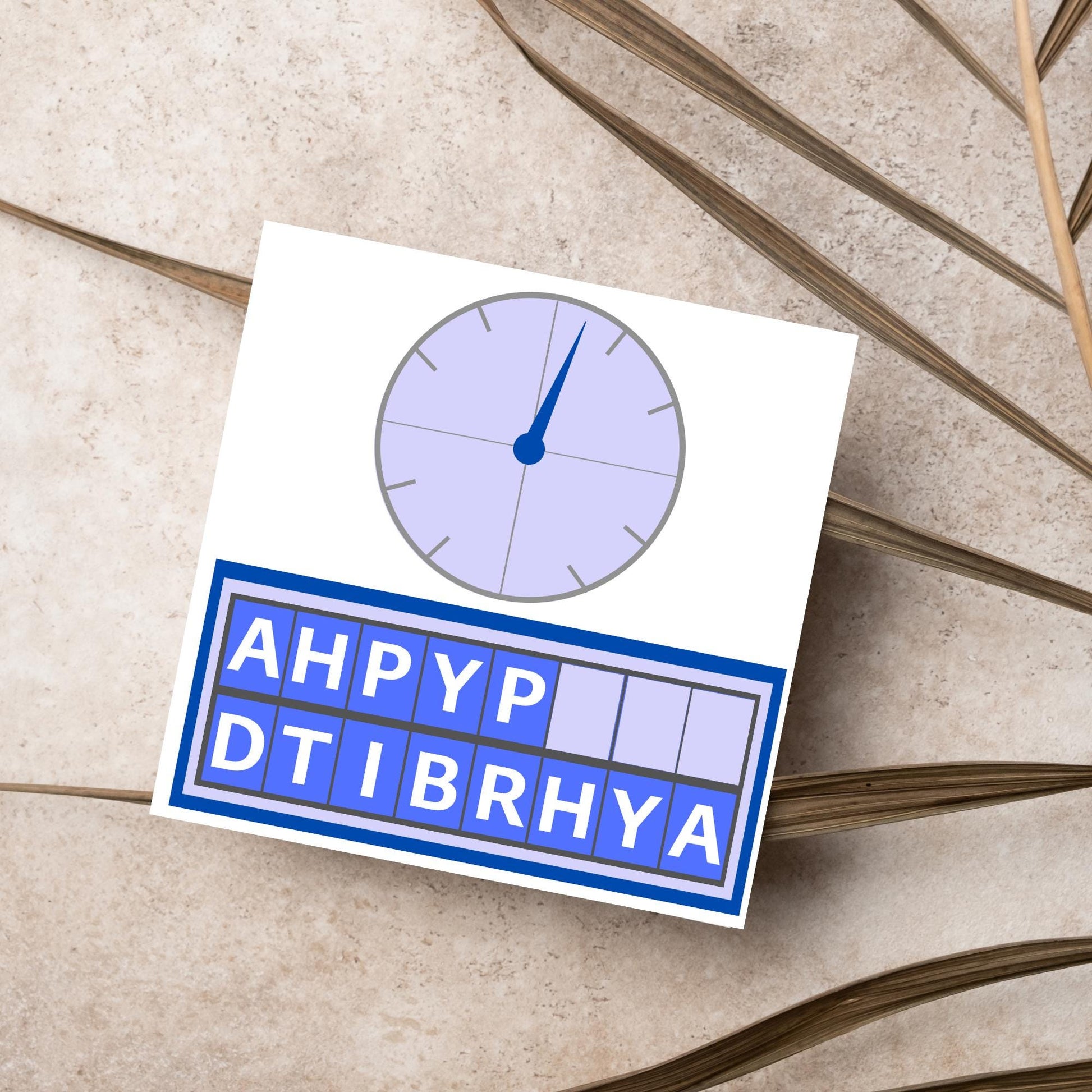 Square birthday card with a countdown theme with the clock and jumbled up letters that spell happy birthday