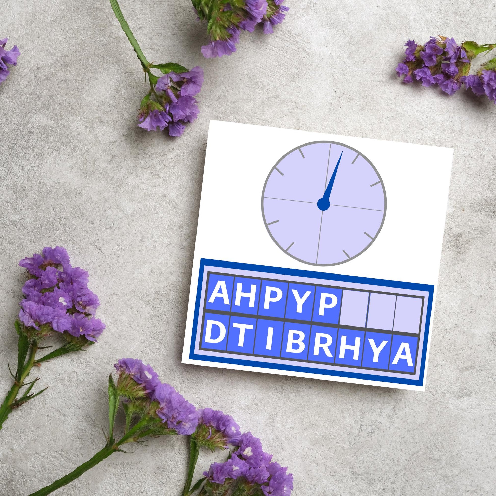 Square birthday card with a countdown theme with the clock and jumbled up letters that spell happy birthday
