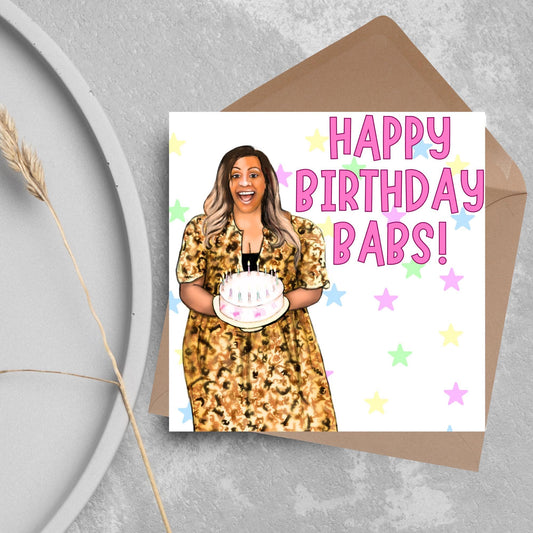 square card with a hand drawn image of Alison Hammond in a leopard print dress, holding a birthday cake and laughing joyfully with a background of multicoloured stars and Big pink text that reads HAPPY BIRTHDAY BABS!